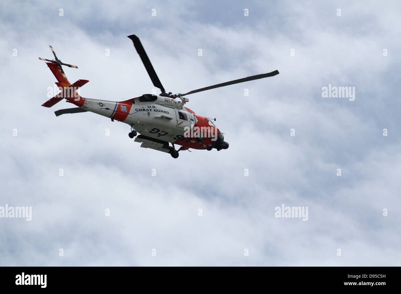 A MH-60J Jayhawk Medium Range Recovery flying overhead Stock Photo