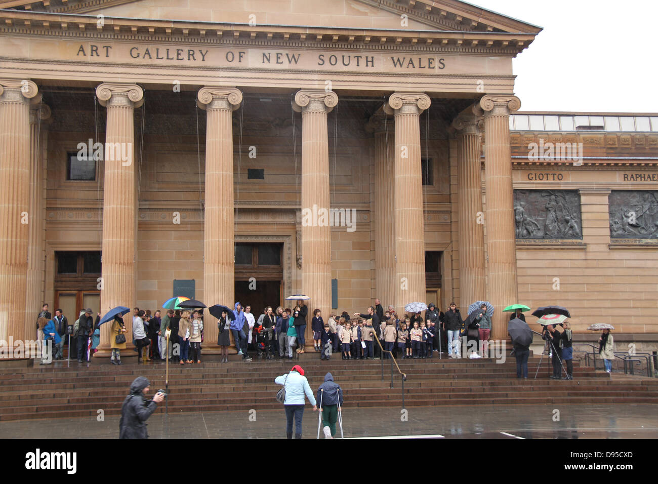 Art Gallery of NSW, Art Gallery Road, Sydney, NSW, Australia. 12 June 2013. Ten women on horseback rode along Art Gallery Road to their final destination in front of the bronze statues of men on horseback guarding the Art Gallery of NSW, in a symbolic stand-off with the dominant male symbols. Lauren Brincat’s performance is titled after the roll call of great male artists and thinkers that adorn the Gallery’s 19th century facade. Credit:  Richard Milnes/Alamy Live News Stock Photo