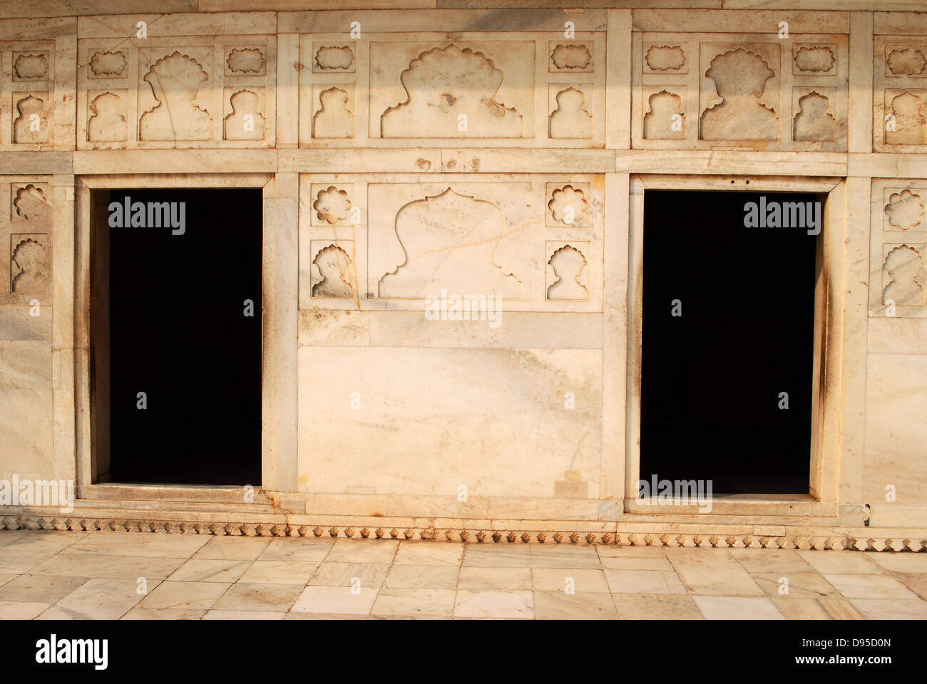 a marble wall with two door entrance,agra fort,india. This marble architecture is inside agra fort. Stock Photo