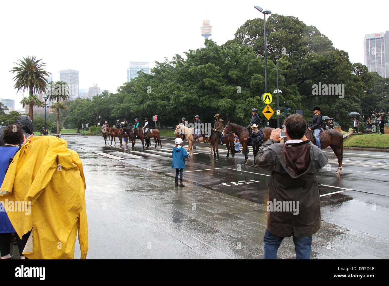 Art Gallery of NSW, Art Gallery Road, Sydney, NSW, Australia. 12 June 2013. Ten women on horseback rode along Art Gallery Road to their final destination in front of the bronze statues of men on horseback guarding the Art Gallery of NSW, in a symbolic stand-off with the dominant male symbols. Lauren Brincat’s performance is titled after the roll call of great male artists and thinkers that adorn the Gallery’s 19th century facade. Credit:  Richard Milnes/Alamy Live News Stock Photo