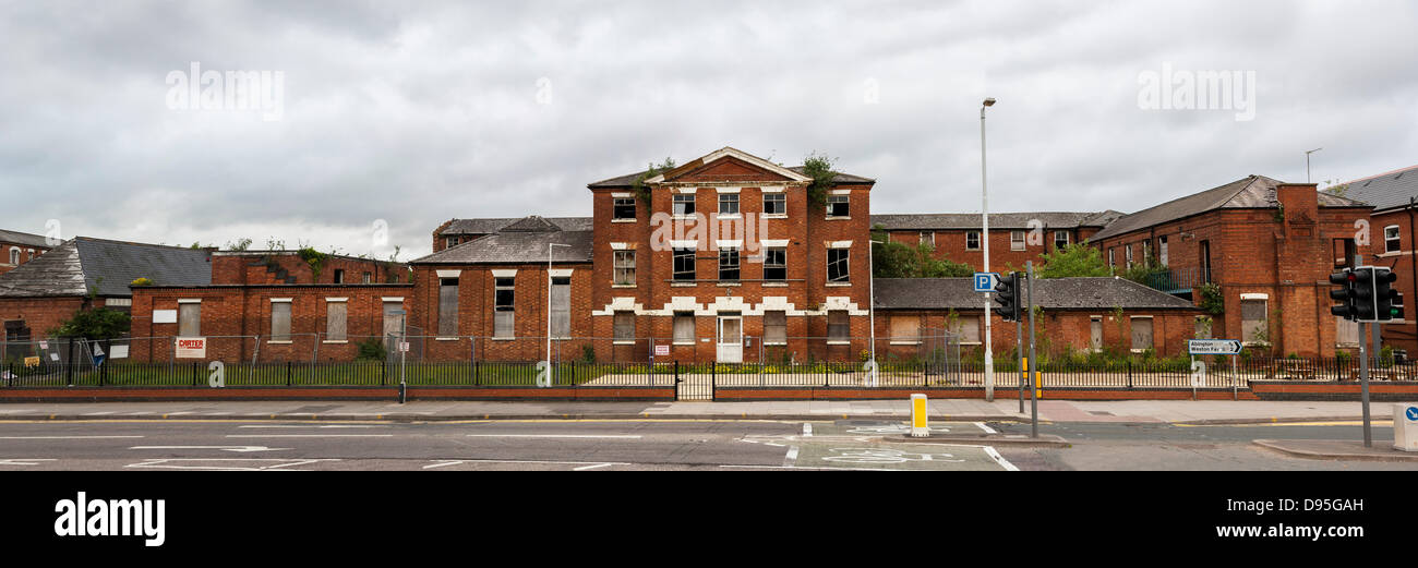 Wellingborough Road, Northampton, UK. 12th July 2013. St Edmund's Hospital. A Grade Two Listed building, designed by Sir George Gilbert Scott and built  in 1836 as a workhouse and converted into a hospital in the 1930s before closing in 1998. Northampton Borough Council's planning committee discussed the building's future, yesterday evening 11th June and recommended it's status remain, in response to the English Heritage consultation on its listed status. A application has been made to English Heritage to remove the Grade Two Listed status, by the buildings new owners, Cypriot company Kayalef Stock Photo