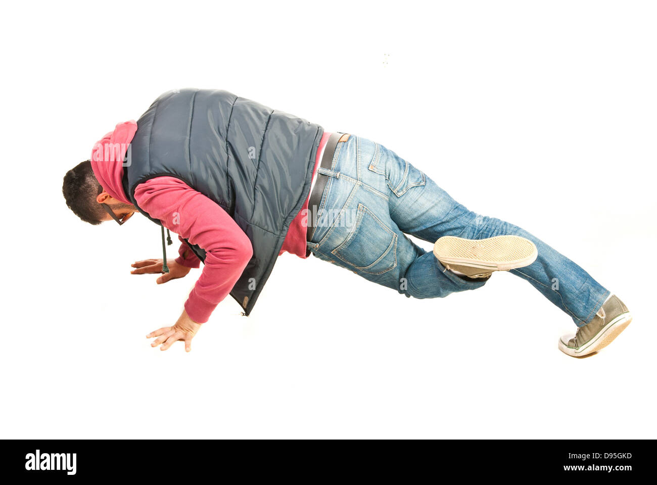 Break dancer in a posture isolated on white background Stock Photo