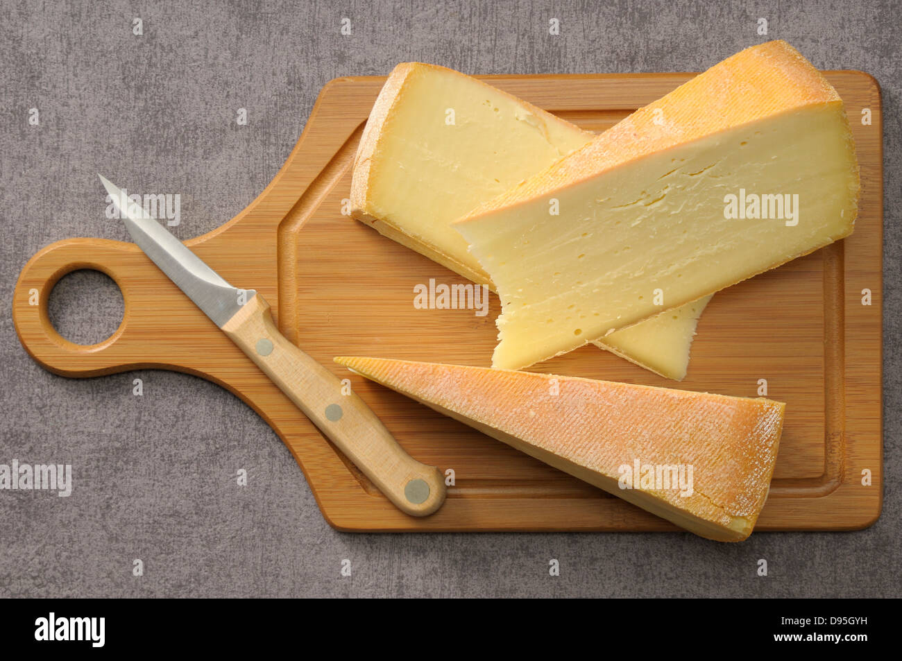 raclette cheese on a table Stock Photo - Alamy