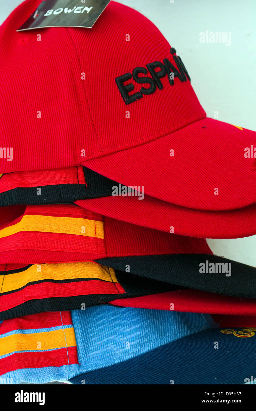 Brightly coloured caps on sale in Seville Spain Stock Photo