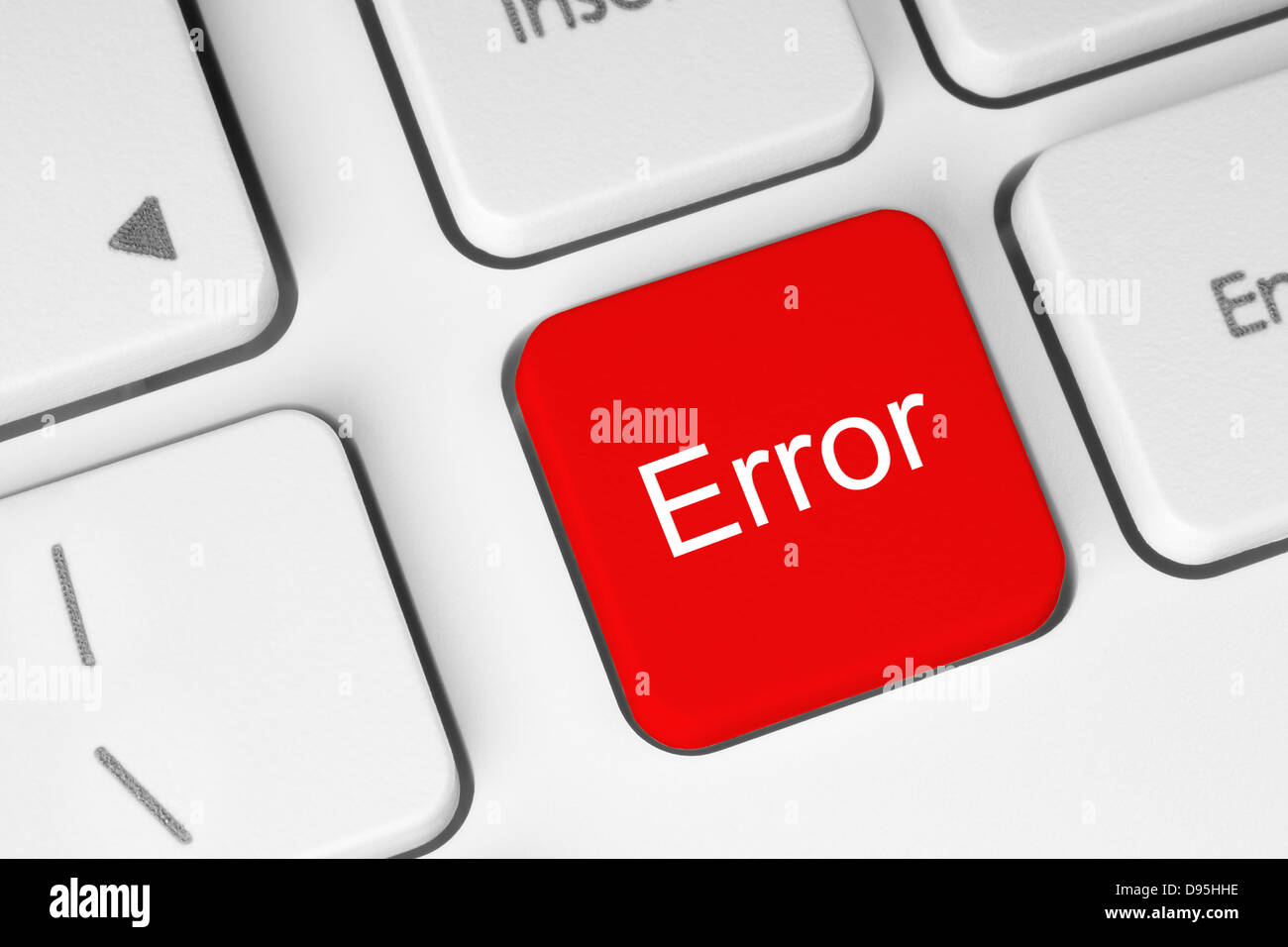 Red error keyboard button close-up Stock Photo - Alamy