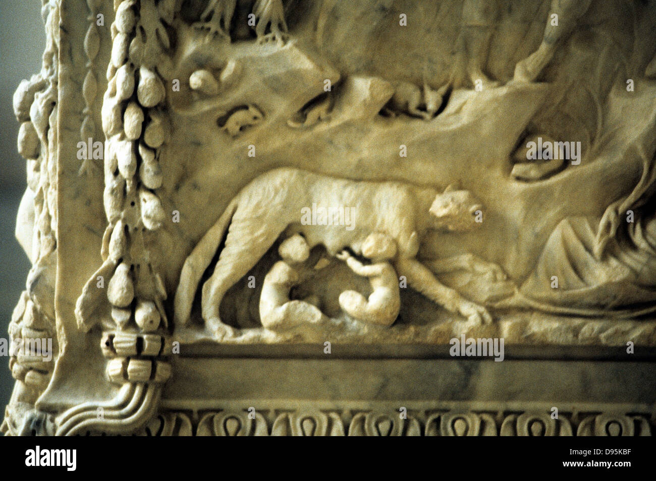 Romulus and Remus suckling from the she-wolf. Detail from marble monument to the twin founders of Rome Stock Photo