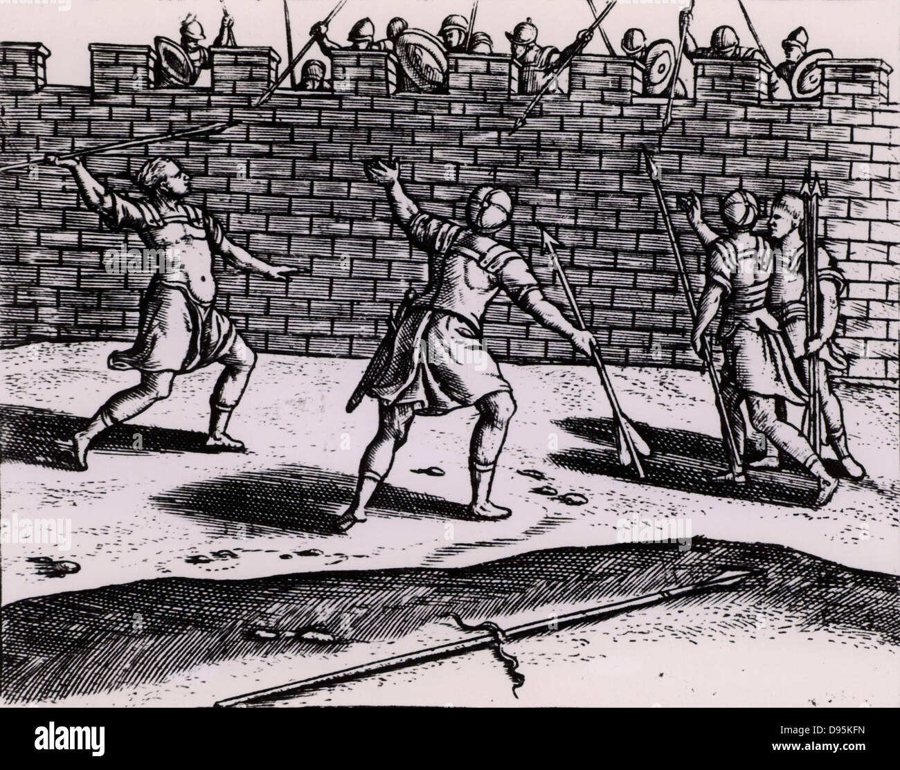 Roman spearmen attacking the walls of a besieged fortress. From 'Poliorceticon sive de machinis tormentis telis' by Justus Lipsius (Joost Lips) (Antwerp, 1605). Engraving. Stock Photo