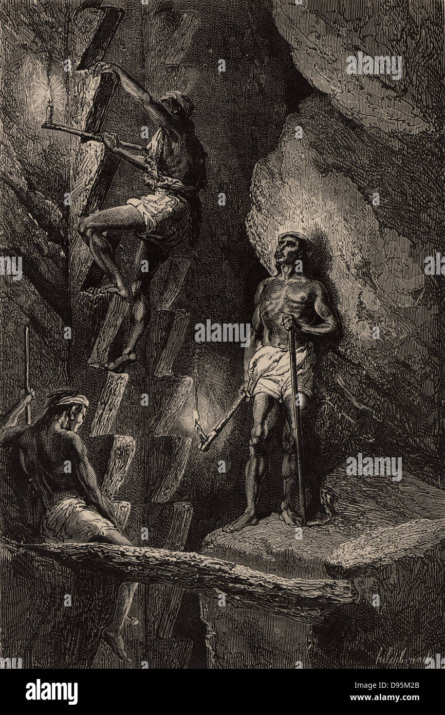 Miners in Chihuahua, Mexico, ascending a mineshaft by means of crude steps carrying candles attached to sticks to light their way. Descending and ascending such shafts was a daily hazard.  The state of Chihuahua has been a source of silver, gold and mercury for many centuries.  From  'Underground Life; or, Mines and Miners' by Louis Simonin (London, 1869). Wood engraving. Stock Photo