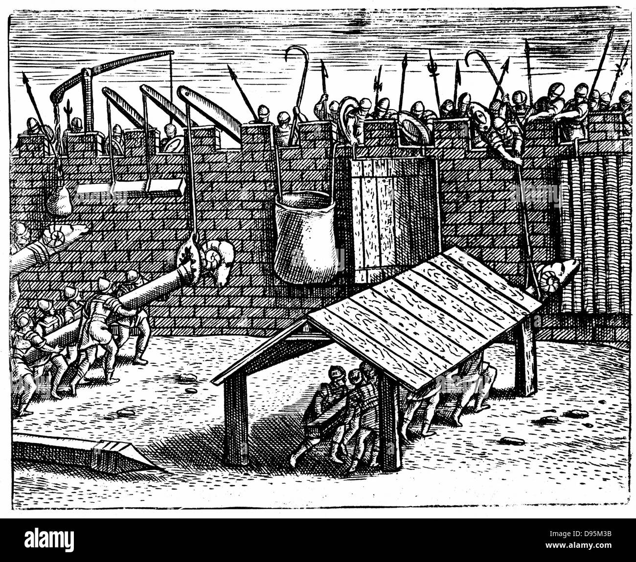 Roman warfare. Defenders attempting to disable battering rams. On right, attackers handling ram under protective 'cat'. From Justus Lipsius 'Poliorceticon' Antwerp 1605. Engraving. Stock Photo