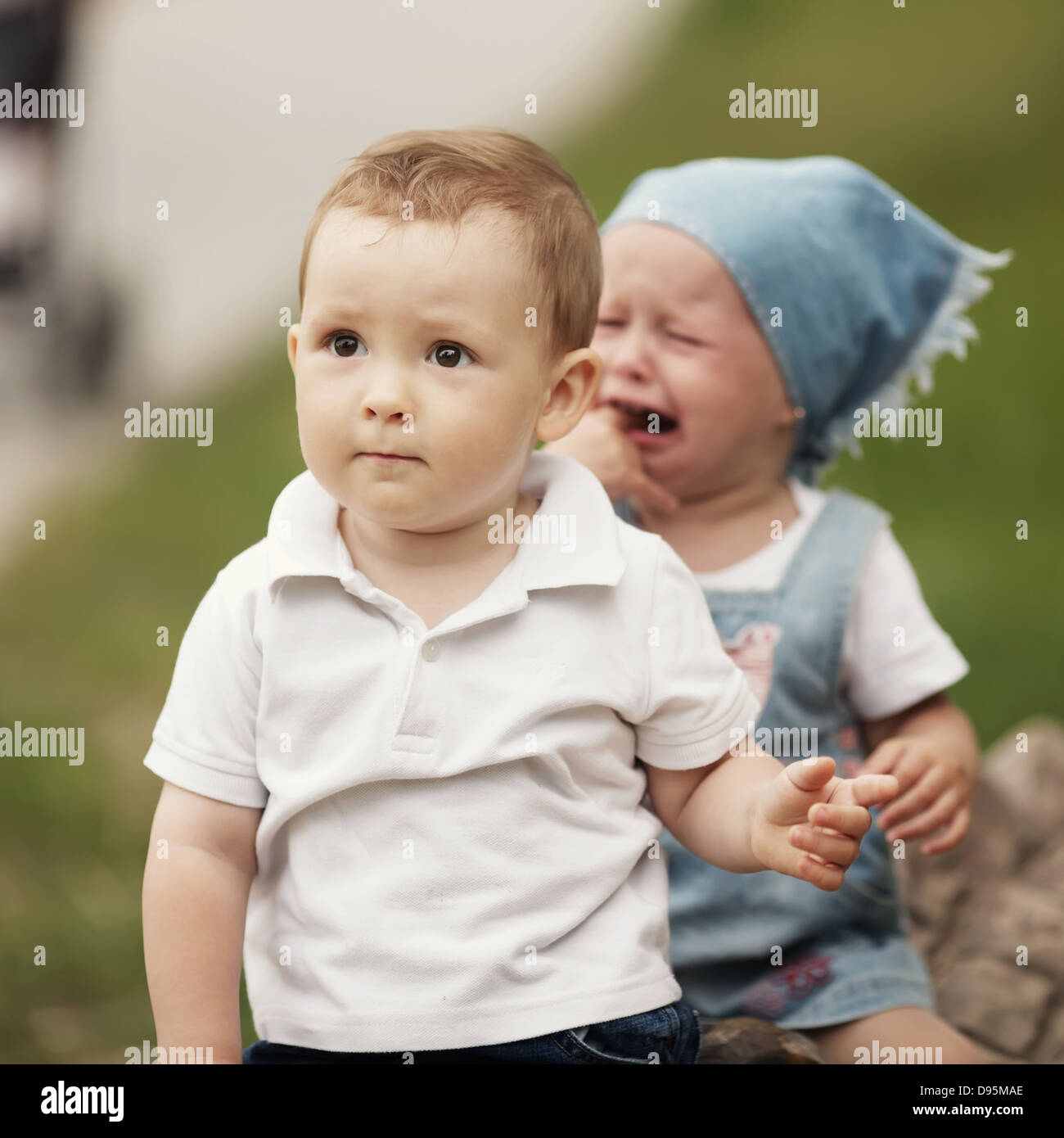 little boy and crying girl Stock Photo - Alamy