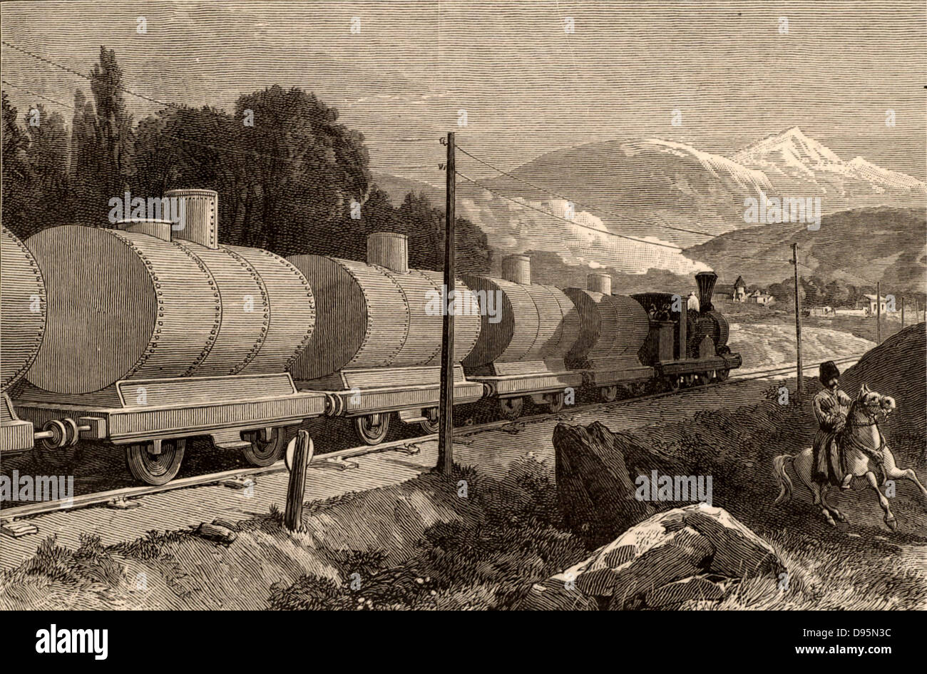 A train of tankers carrying oil from the Nobel Brothers oil wells at Baku (Baky or Baki), Azerbaijan, for distribution in Russia. Engraving from 'The Illustrated London News' (London, 10 July 1886). Stock Photo