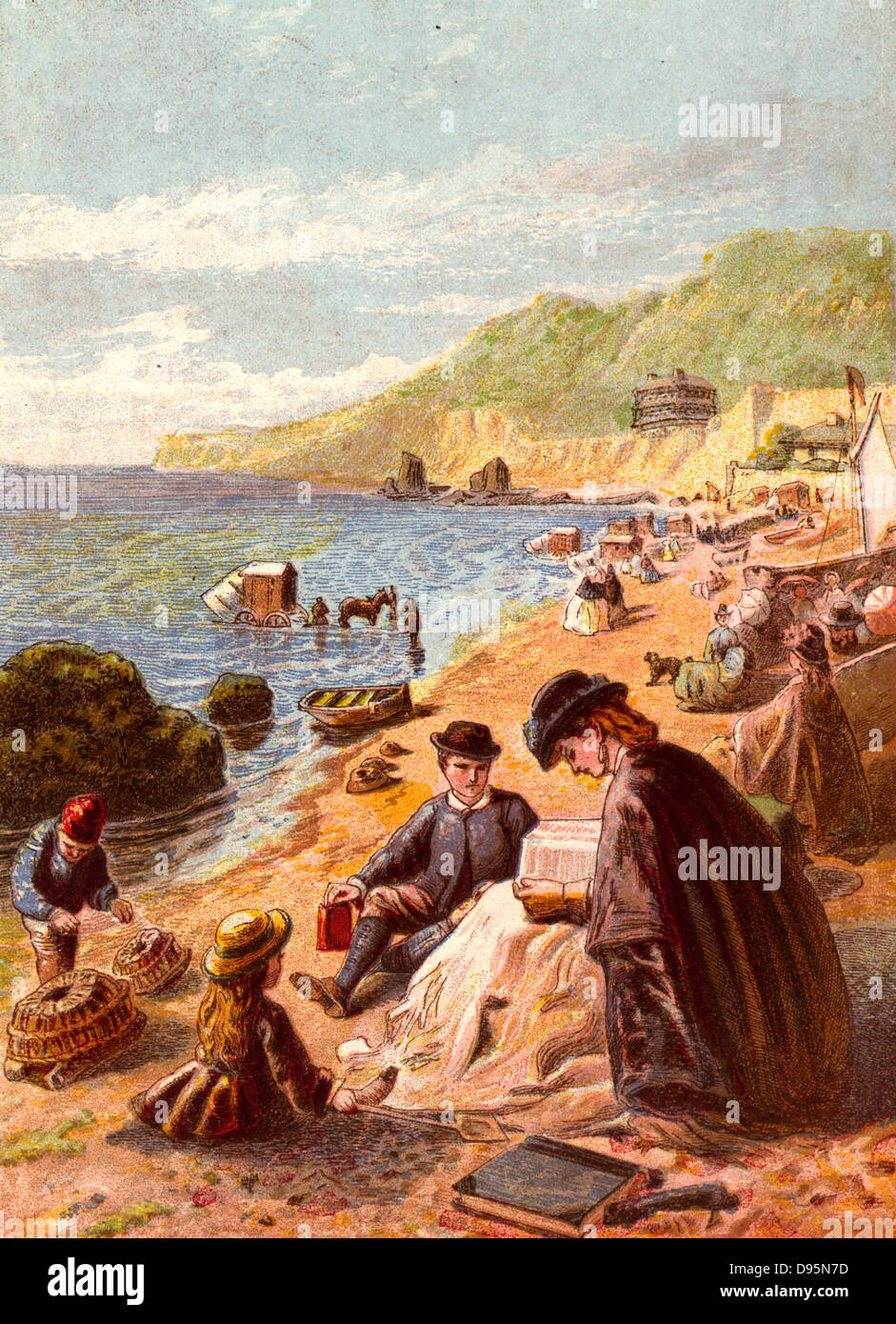 Seaside holiday scene. Families sitting decorously on the beach in clothing though appropriate.  In the background bathing machines are in use. Kronheim chromolithograph from 'Pictures from Nature' by Mary Howitt (London, 1869). Stock Photo