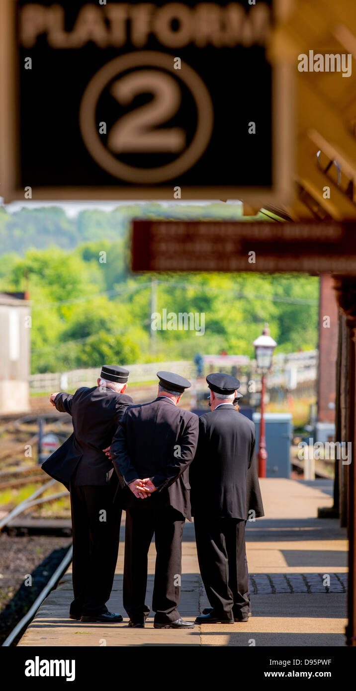 The Bluebell Railway in East Sussex, UK. The first standard guage steam preservation railway. Guards at Sheffield Park Station. Stock Photo