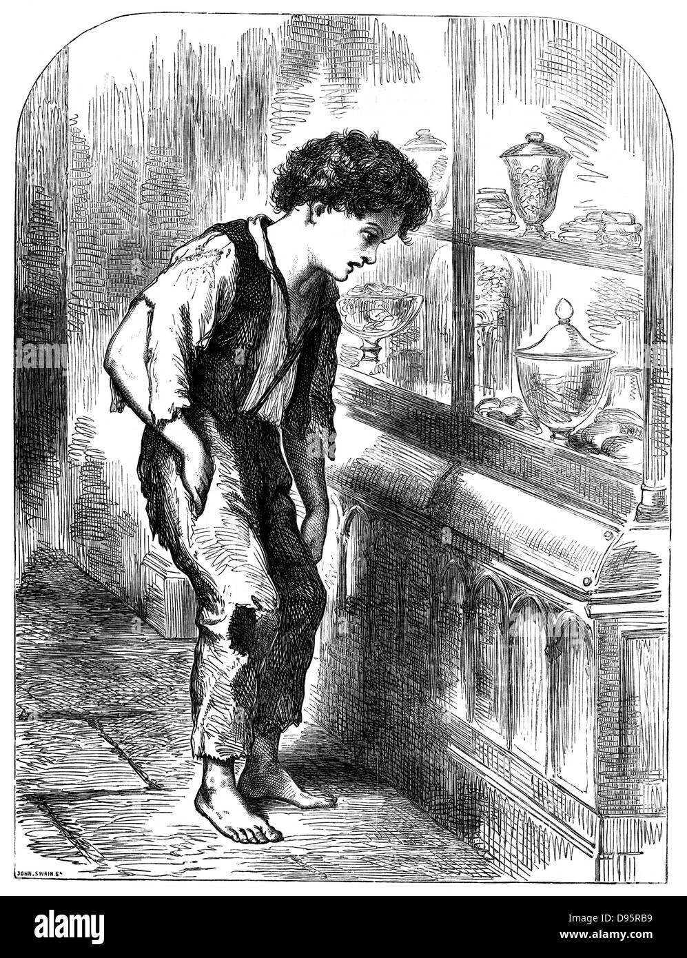 London Street Arab, shoeless and in rags, looking longingly at the sweets in a confectioner's window.  From 'Le Voleur' Paris 1883. Wood engraving. Stock Photo
