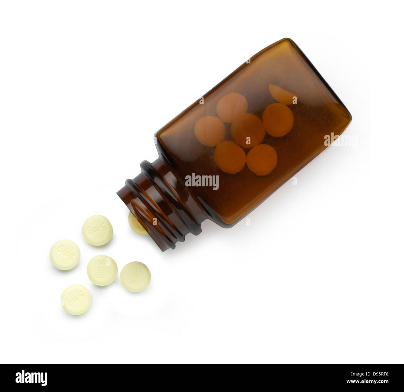 pot with white pills cut out onto a white background Stock Photo