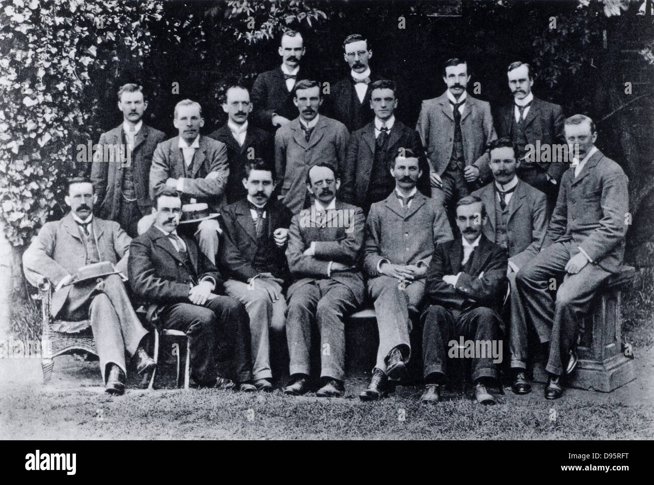 Cavendish Laboratory, Cambridge, England: research students, 1898.  J(oseph) J(ohn) Thomson (1856-1940) is in the centre of the front row with his arms crossed. In the middle row are C(harles) T(homson) R(ees) Wilson and Ernest Rutherford (1871-1937), 3rd and 4th from left respectively.  From 'Recollections and Reflections' by JJ Thomson (London, 1936). Stock Photo