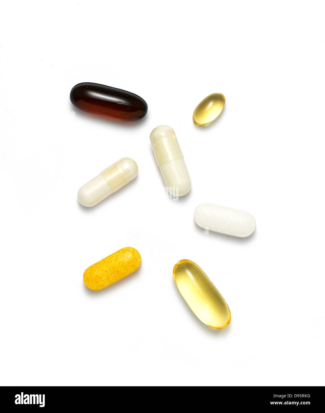 pills and vitamins cut out onto a white background Stock Photo