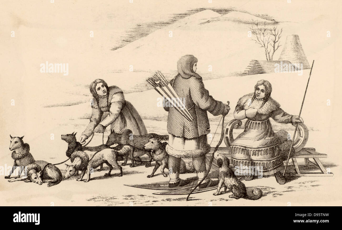 Inhabitants ot the Kamchatka Peninsula, Russian Far East, travelling in winter.  These people of the Arctic are clothed in furs and animal skin.  The man has snow shoes and is carrying a bow and arrows.  The women are travelling by dog sledge.  Engraving Stock Photo