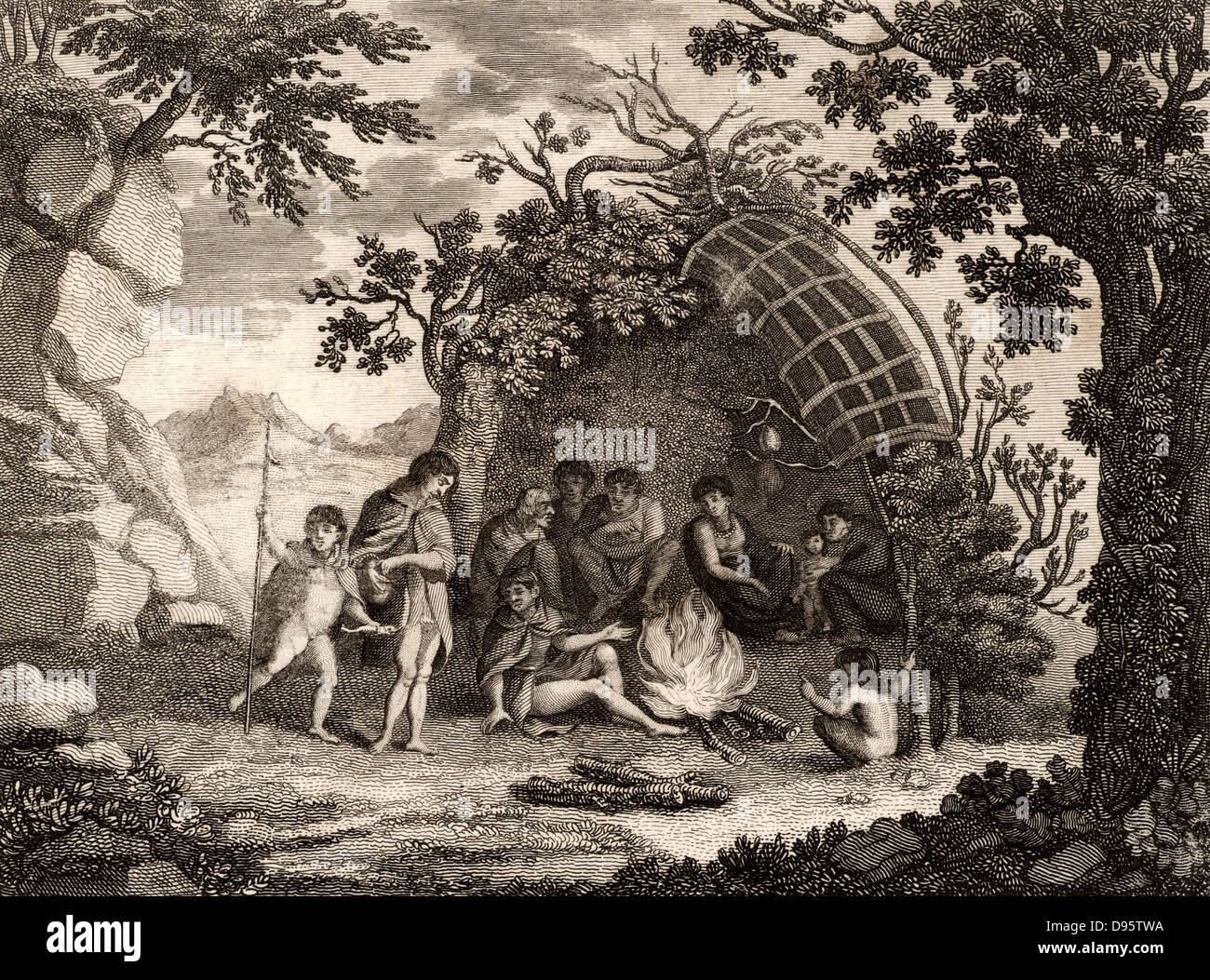 View of the Indians of Terra Del Fuego with a representation of a Hut, and their mode of living'.  James Cook (1728-1779) British navigator, explorer and cartographer visited Terra del Fuego, at the south of South America, in January 1769 during his first voyage in the 'Endeavour' (1768-1771). Magellan was the first European to encounter the Fuegians on his voyage of circumnavigation (1519-1522).  Engraving from 'Captain Cook's Original Voyages Round the World' (Woodbridge, Suffolk, c1815). Stock Photo