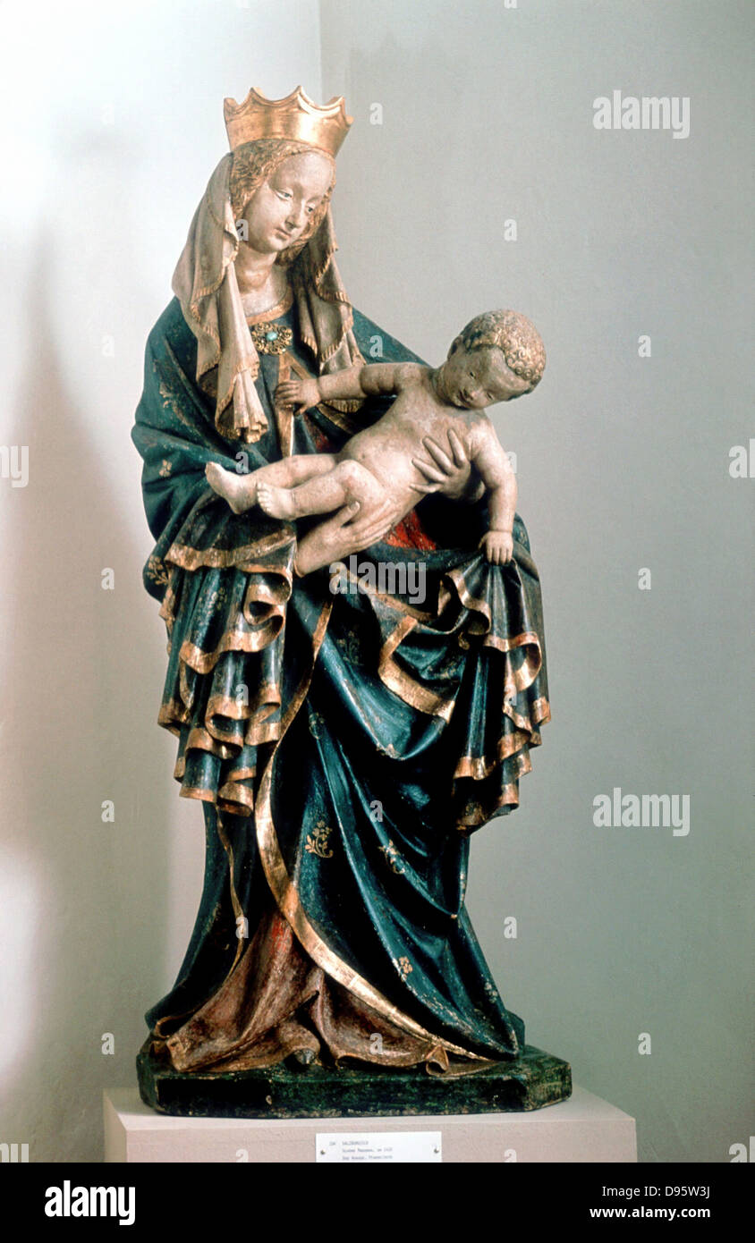 Schone Madonna' Virgin Mary holding the baby Jesus. Painted statue, Pfarrkirche, Bad Aussee, Austria. Stock Photo