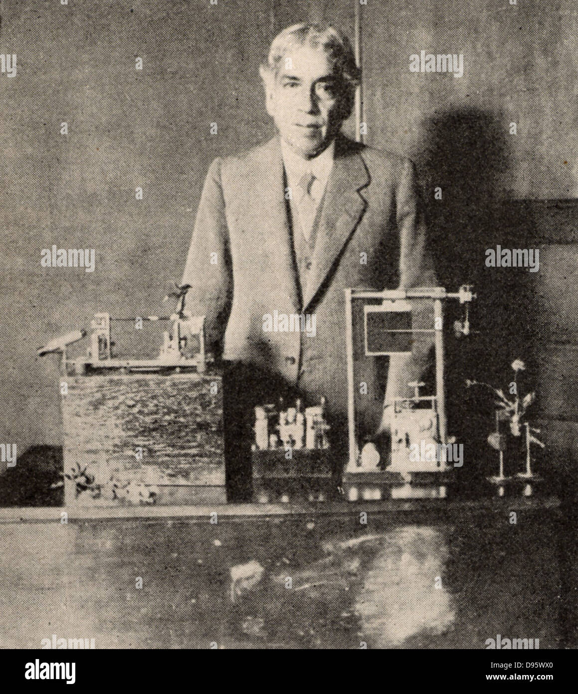 Jagadis Chandra Bose (1858-1937) Indian botanist and physicist, demonstrating electrical changes in plant stems (1926).  Halftone from a photograph. Stock Photo
