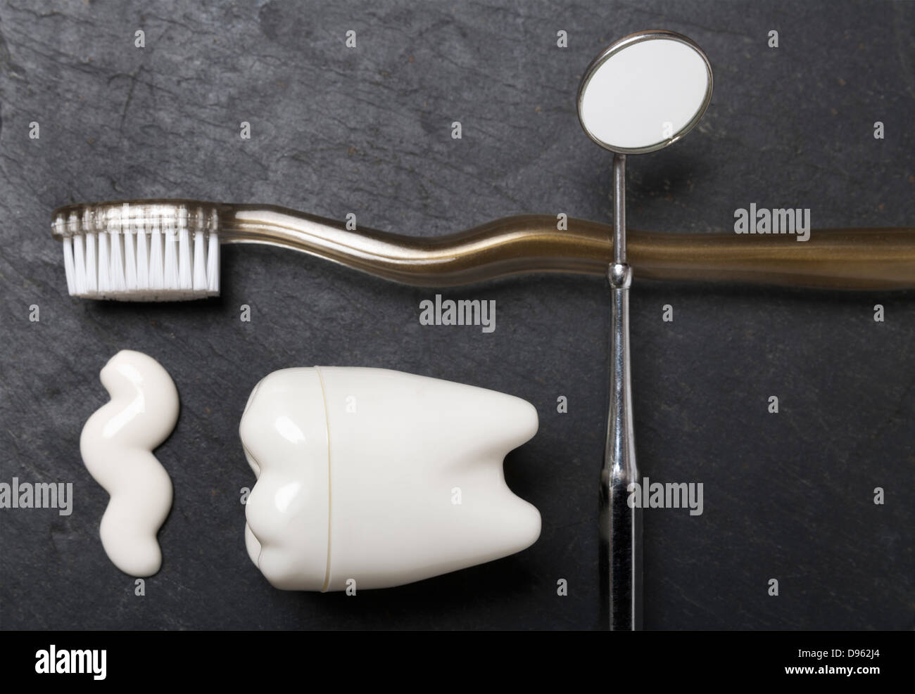 Tooth shaped plastic container, dentist mirror, tooth brush and paste