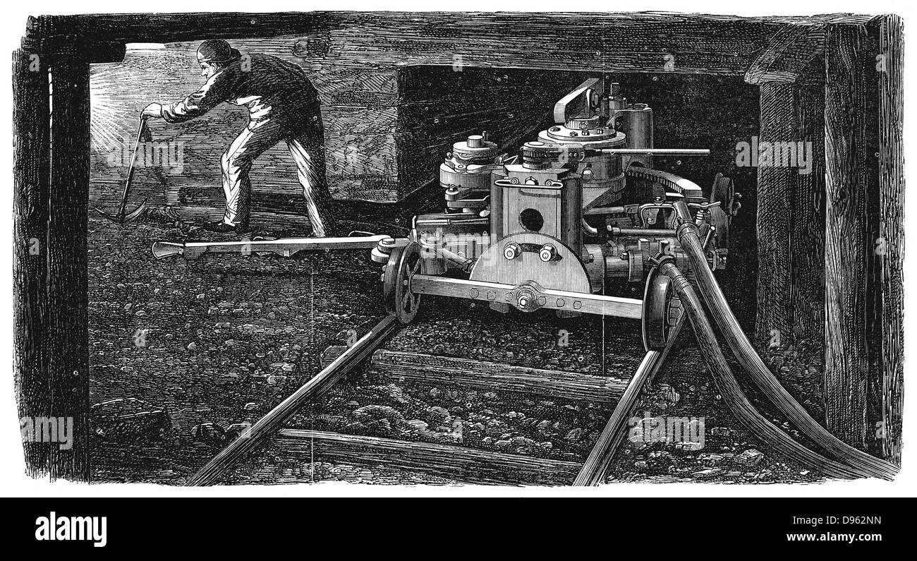 Hydraulic coal cutting machine, named 'The Iron Man', in position on rail track undergground in a coal seam. Made by Carrett, Marshall & Co., and shown at the Paris International Exposition of 1867. Wood engraving. Stock Photo