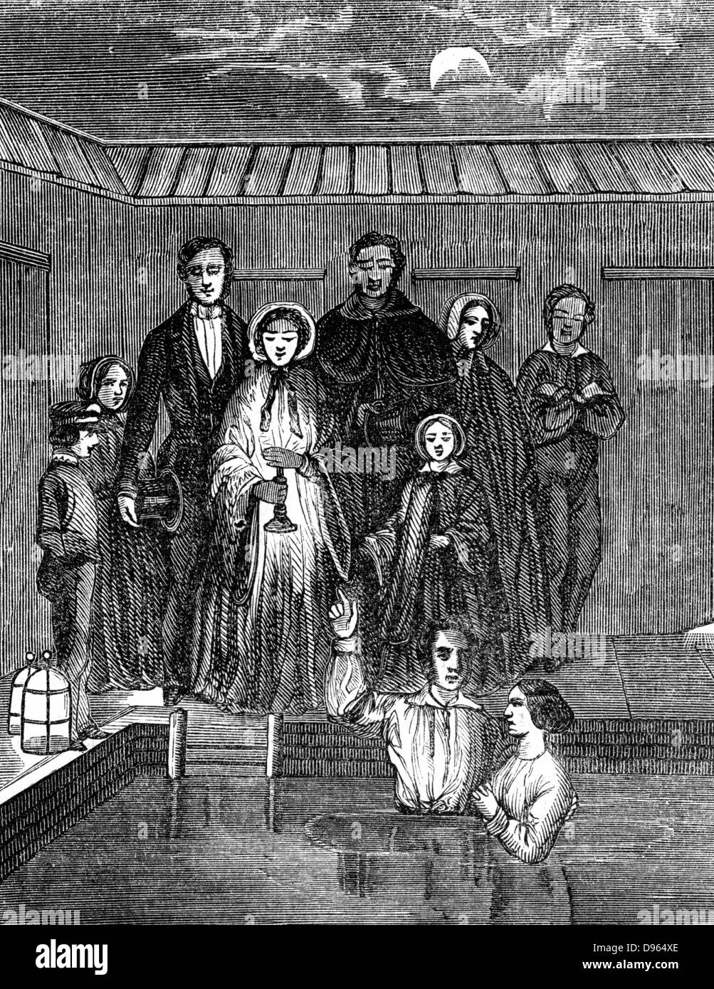 Mormons (Latter-Day-Saints). Baptism by total immersion, Salt Lake City, Utah. From 'Illustration' ( Paris 1853). Wood engraving. Stock Photo