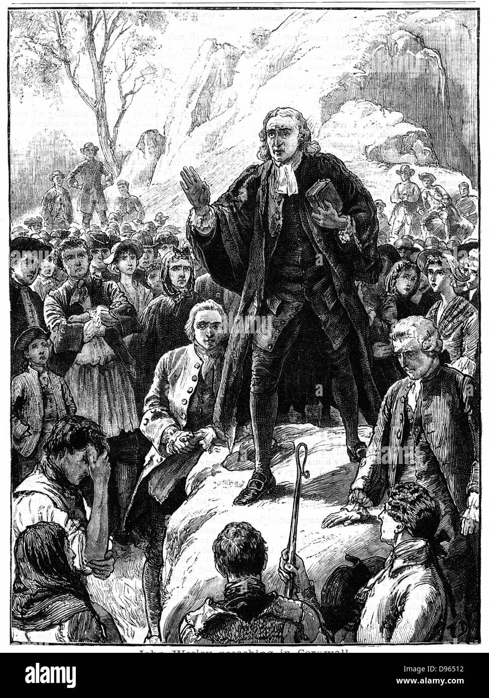 John Wesley (1703-1791) English non-conformist preacher. Founder of  Methodism. Wesley preaching in the open air Cornwall, England. Woodcut 1888. Stock Photo