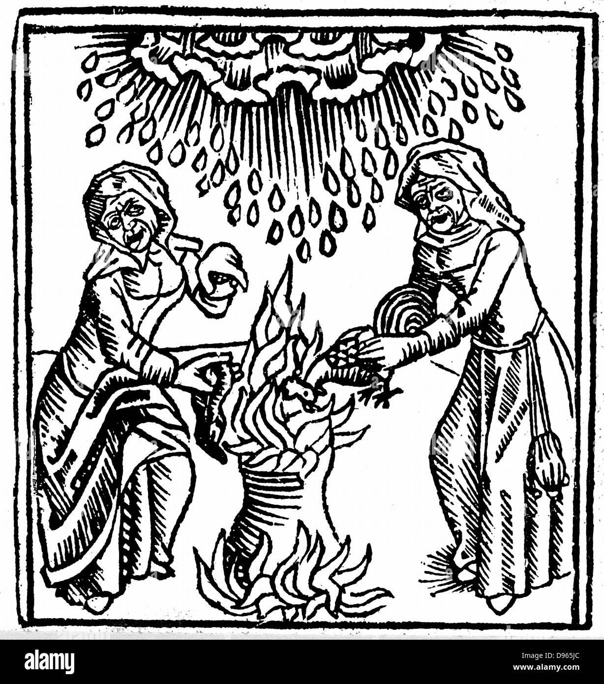 Witches casting a spell to bring rain. Woodcut from Ulrich Molitor 'De Laniis et phitonicis mulieribus', Constance, 1489 Stock Photo
