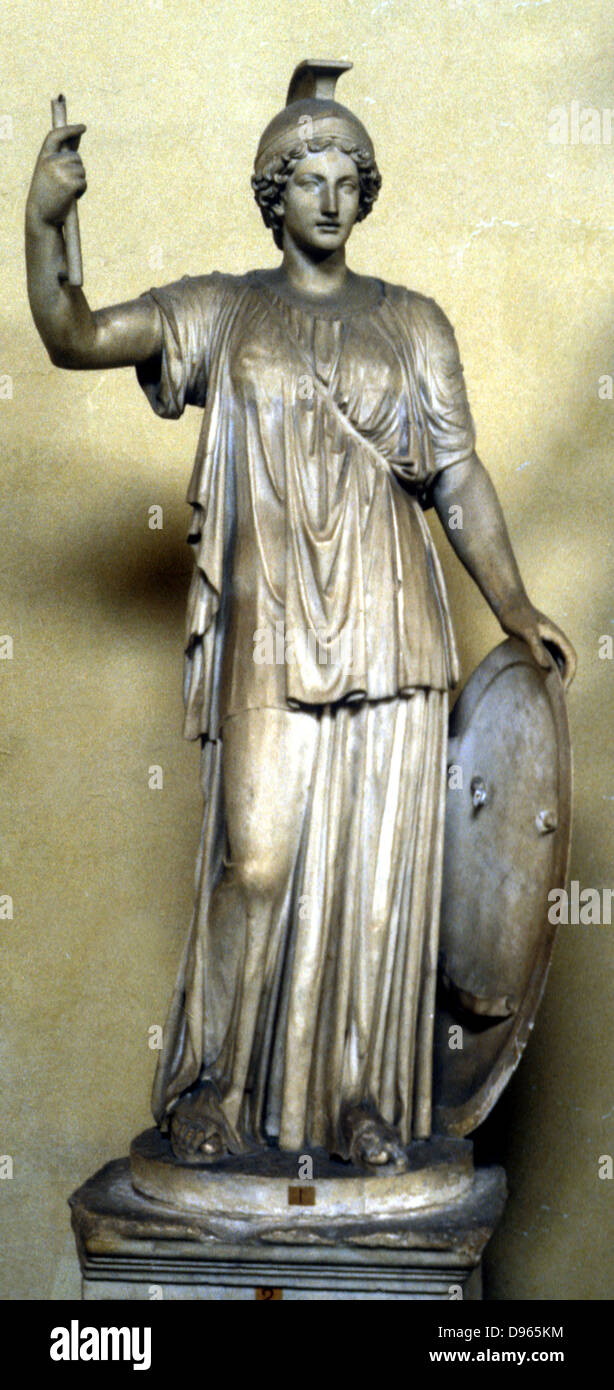 Minerva: Ancient Roman goddess of wisdom, patroness of arts, wearing helmet and holding shield. Athene in Greek pantheon. Statue. Stock Photo