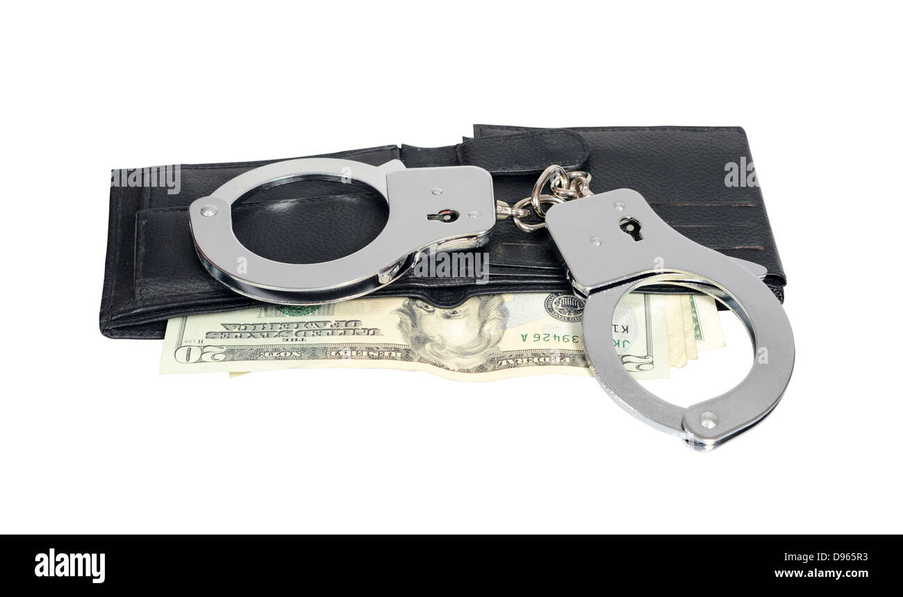 Dollars and handcuffs Stock Photo