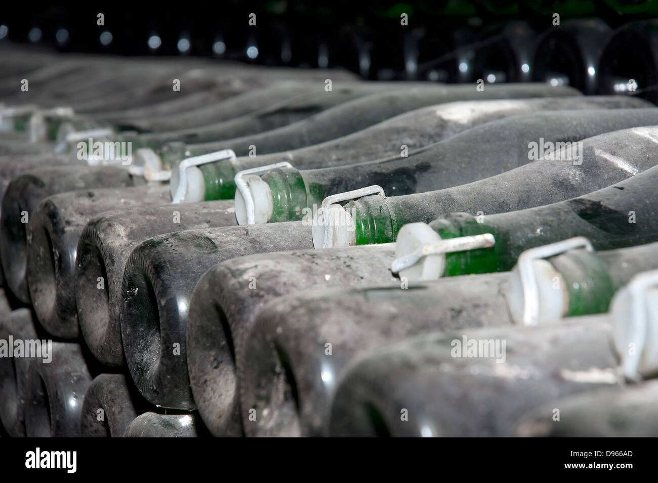 Stack of wine bottles in winery. Champagne wine storage Stock Photo Alamy