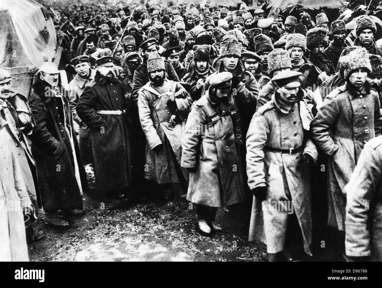 Russians taken prisoner by Germany on the Eastern front, World War I. Among them are many Cossacks in their distinctive fur hats. Stock Photo