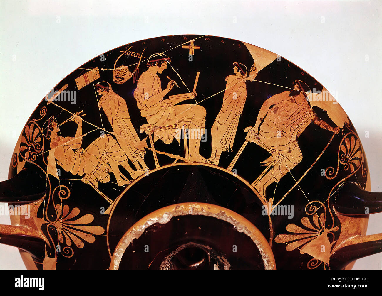 Masters and pupils at the Athenian school where studies included music. Greek red figure vessel . Staatliche Museum Berlin Stock Photo