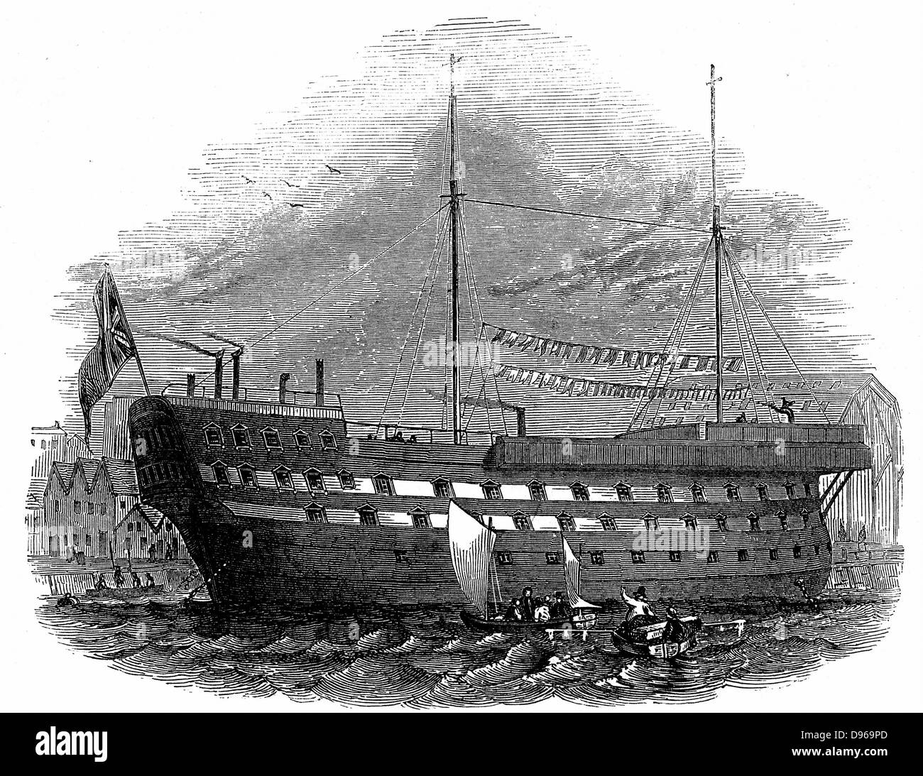 Prison Hulks: Convict hulk 'Warrior' at Woolwich. This hulk held 600 and was an intermediate confinement between an ordinary gaol or transportation.  Prisoners were used as labourers in the naval dockyards Hulks (Tenders) were usually old naval vessels that were no longer seaworthy. From 'The Illustrated London News', 1848.  Wood engraving Stock Photo