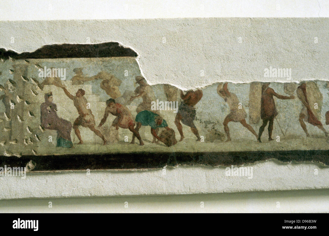 Roman workers building a wall; slaves watched by a taskmaster. Fragment of a wall painting Stock Photo