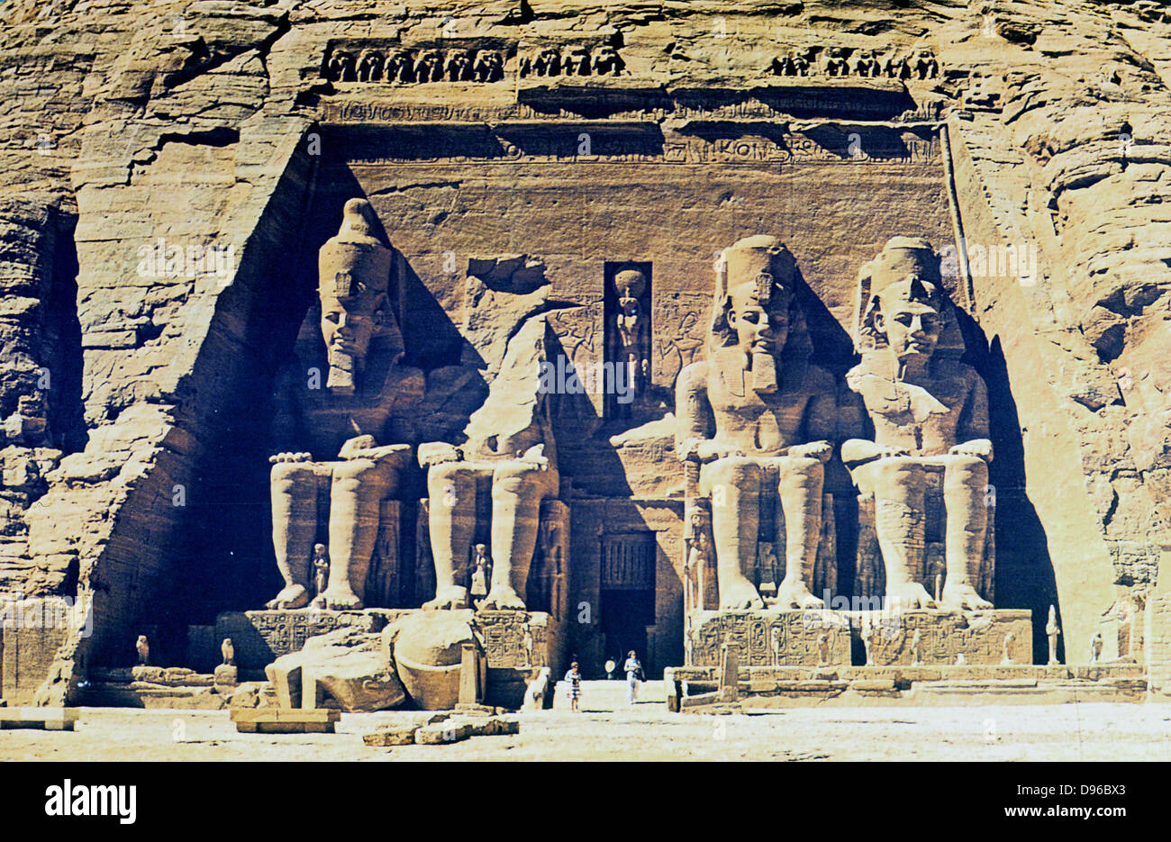 Sandstone statues of Rameses (Ramses) II (ruled c1304-c1273 BC) outside entrance to main temple at Abu Simbel (Abu Sunbul). Temple dedicated to sun gods Amon-Re and Re-Horakhte.  Not known outside Egypt in modern times until 1813 and explored in 1817 by Belzoni. Stock Photo