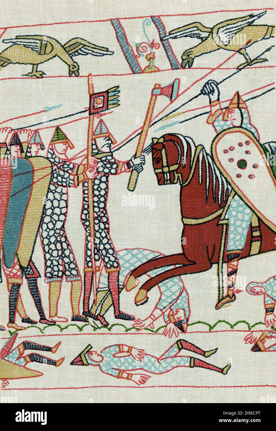 Harold II's (c1022-1066) Anglo-Saxon troops (left) led by armoured standard bearer and warrior with axe, confront Norman cavalryman armed with lance:1066. After a detail from the Bayeux Tapestry. Lithograph. Stock Photo