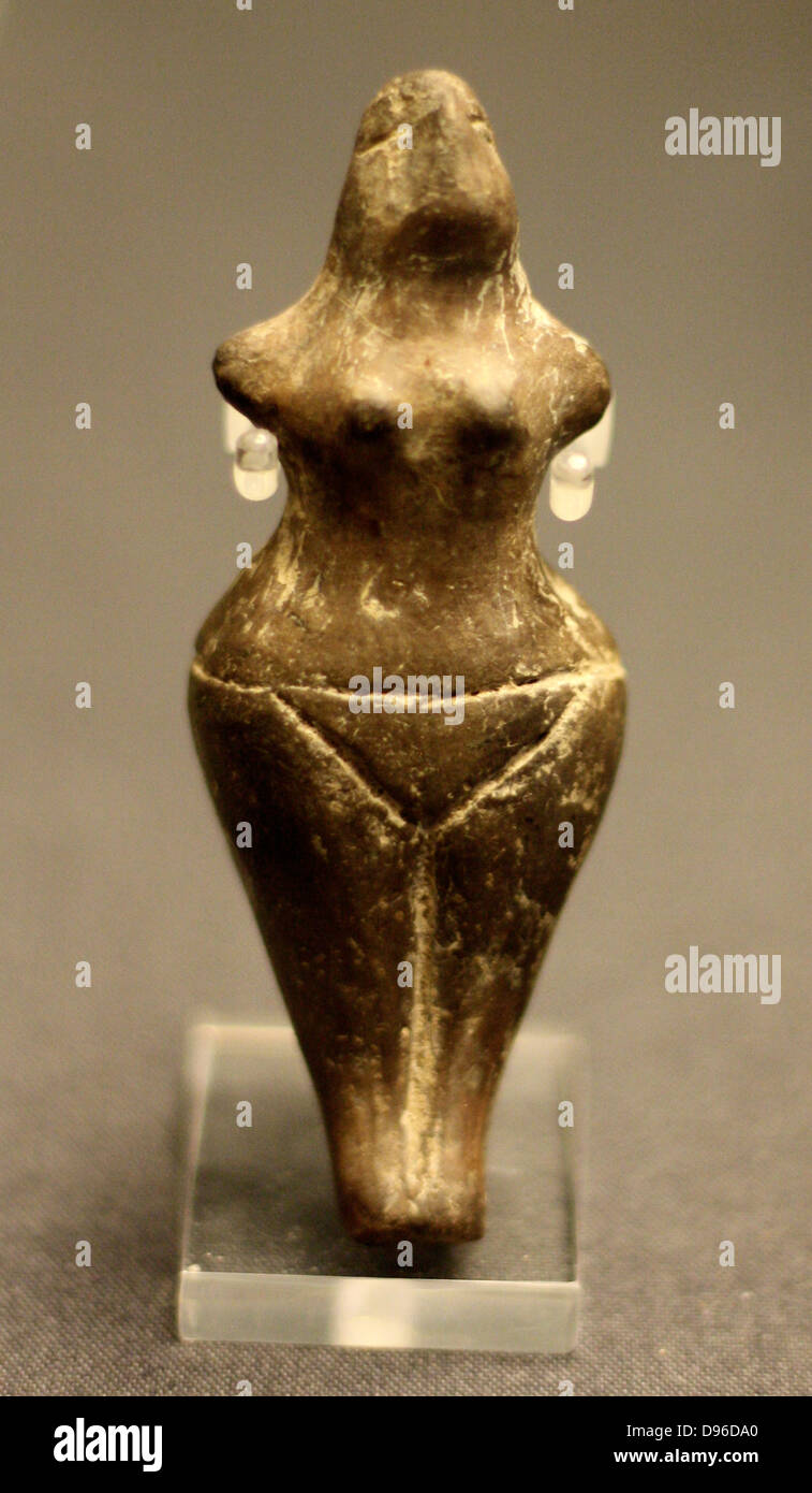Terracotta Figureines of a woman Late Neolithic, 5300-4500 Bc Probably from Greece. Terracotta figurines were widely produced in the eastern Mediterranean region during the Neolithic period. The rounded forms of this figure evoke the concept of female fertility, though male figures, groups and animals are also known. the use of clay died out in the Cyclades in the Early Bronze age Stock Photo