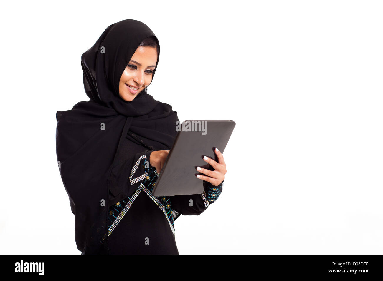 pretty modern Arabian woman with tablet computer isolated on white Stock Photo