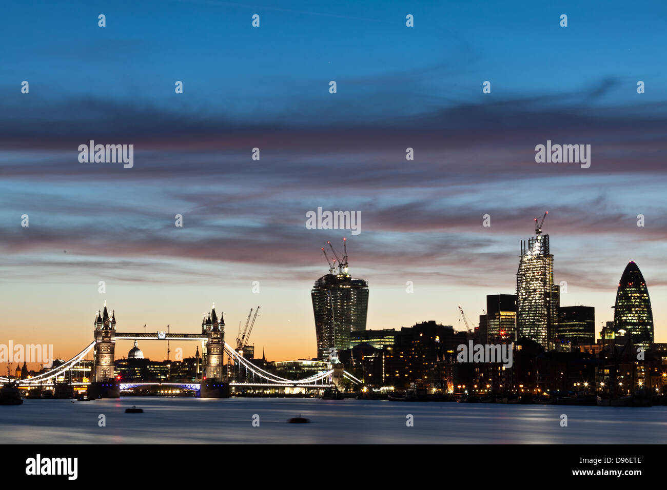 Night shot of Tower bridge and the city of London Stock Photo