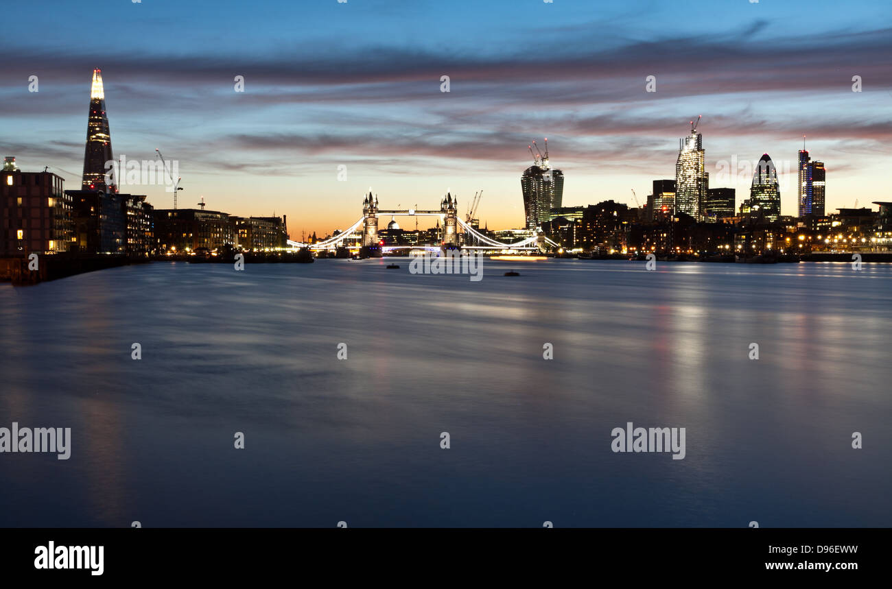 Night shot of Tower bridge and the city of London Stock Photo