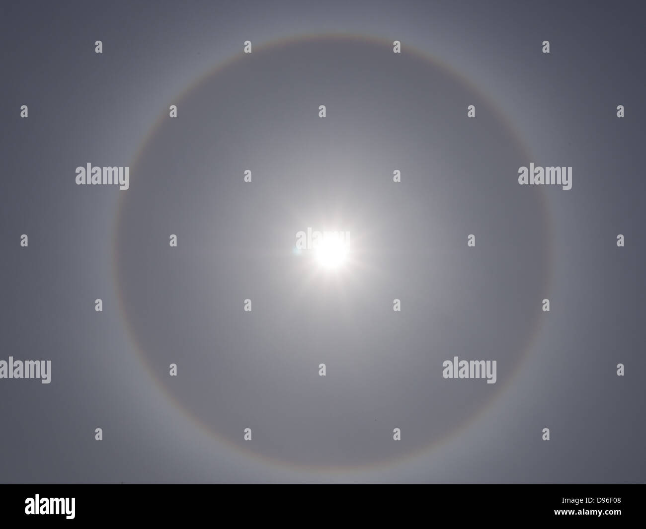 ring of flare or rainbow around the sun Stock Photo