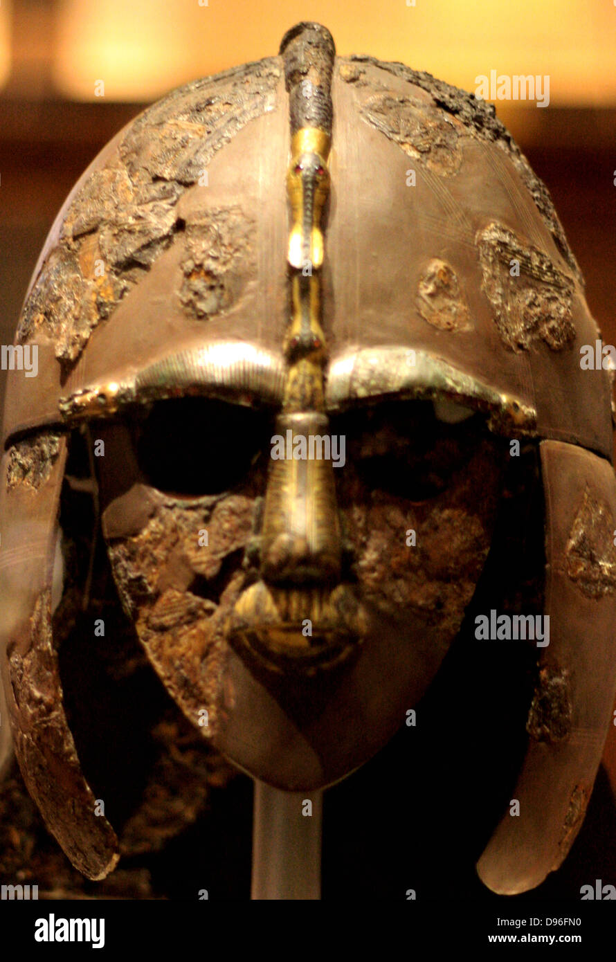 Sutton Hoo helmet. Early 7th century AD, England. One of only 4 early medieval helmets found in England. Made of Bronze, Silver wire and garnet. Features decorated panels depicting heroic scenes. Stock Photo