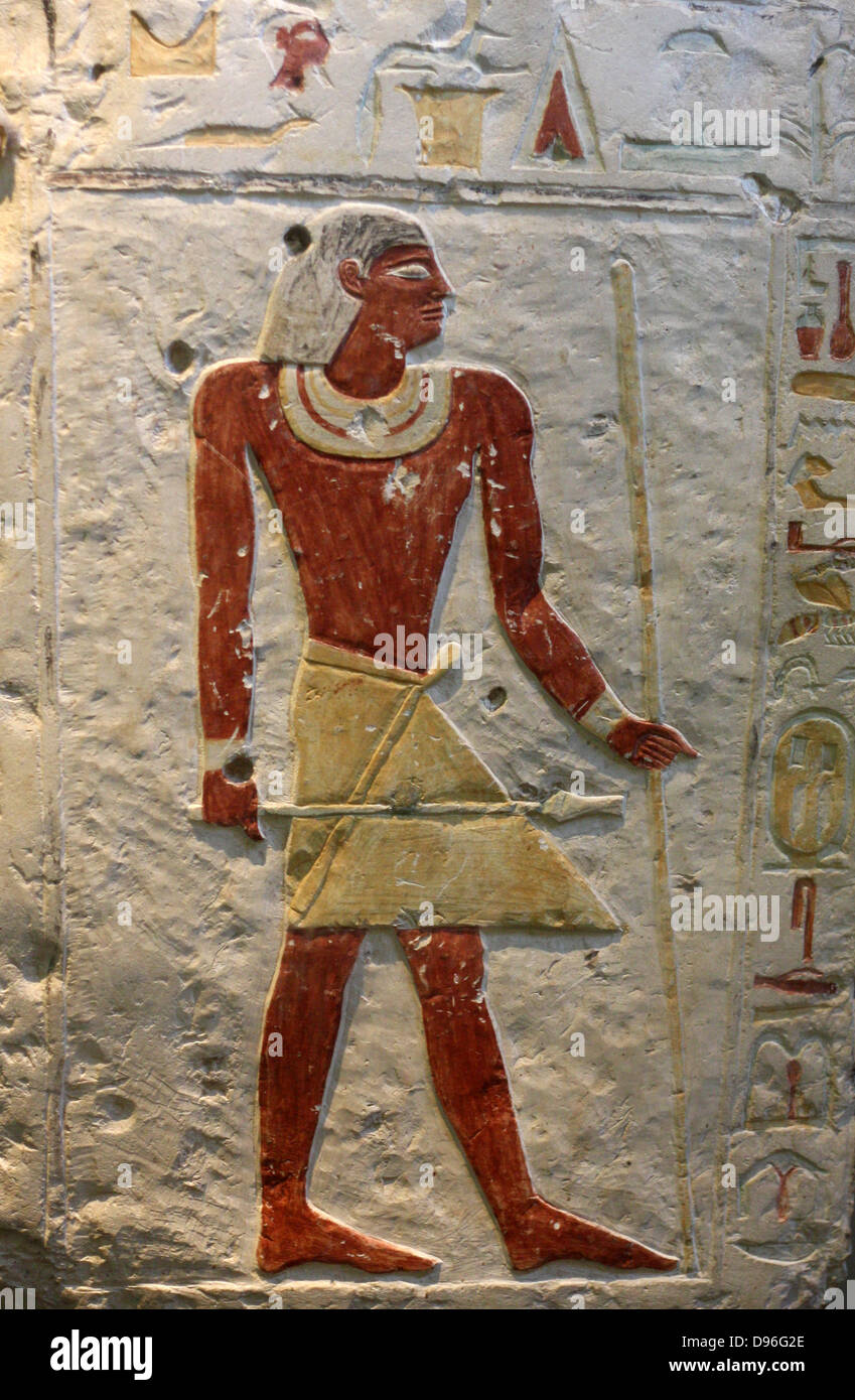 Tomb Slab of Neferseshempepy. Limestone, late Old Kingdom, about 2150 BC. From his tomb at Dendera. The slab bear an offering formula and some of Neferseshempepy's titles. He carries a stick of age or authority and a sceptre. The figure's thinness and the style of the hieroglyphs are typical of the late Old Kingdom. Stock Photo