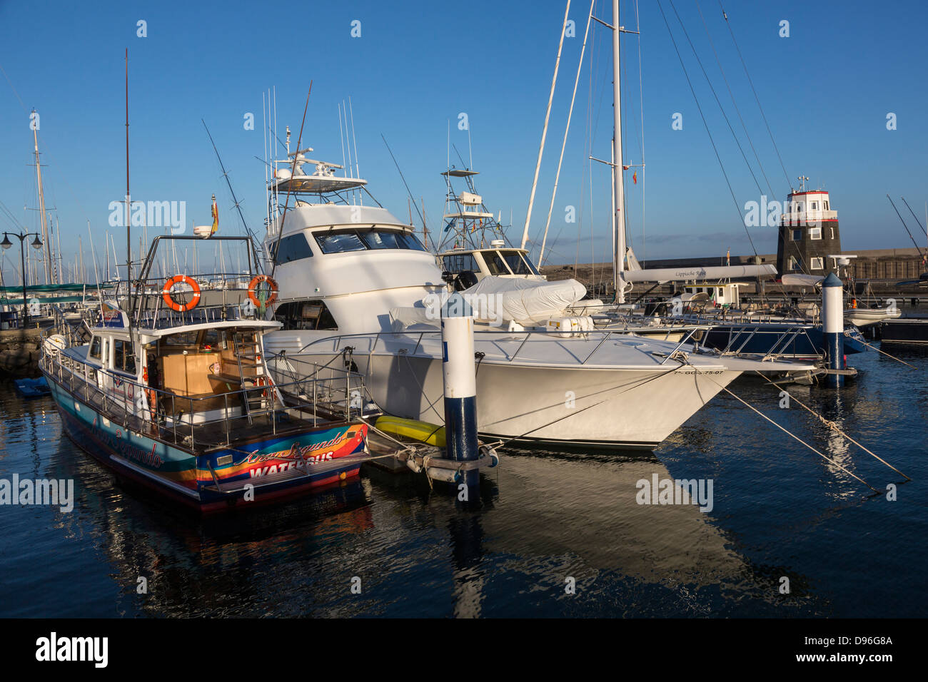 Boats moored in harbour, Puerto Calero, Lanzarote, Canary Islands, Spain Stock Photo