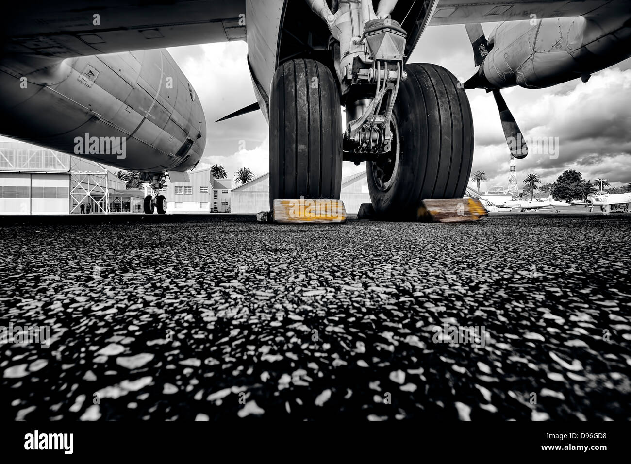 Old plane on the ground, view of landing wheels Stock Photo - Alamy