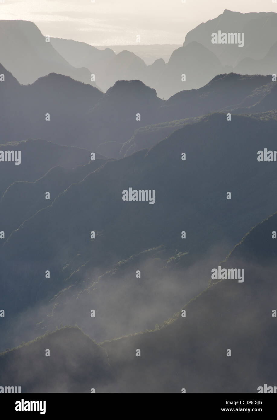 Mountain ridges of the Cirque de Mafate caldera on the French island of Reunion in the Indian Ocean. Stock Photo