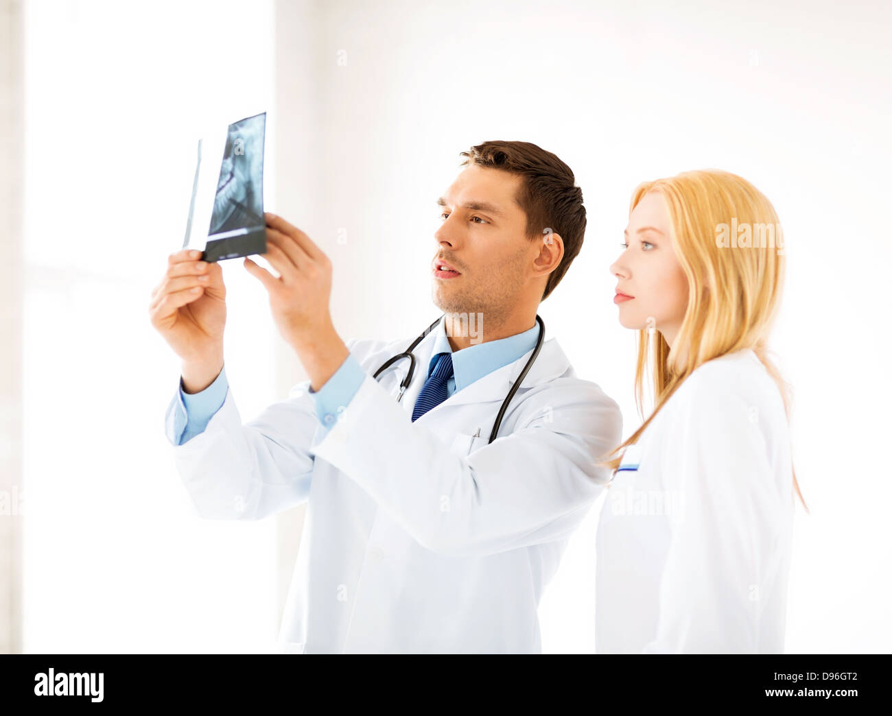 two doctors looking at x-ray Stock Photo
